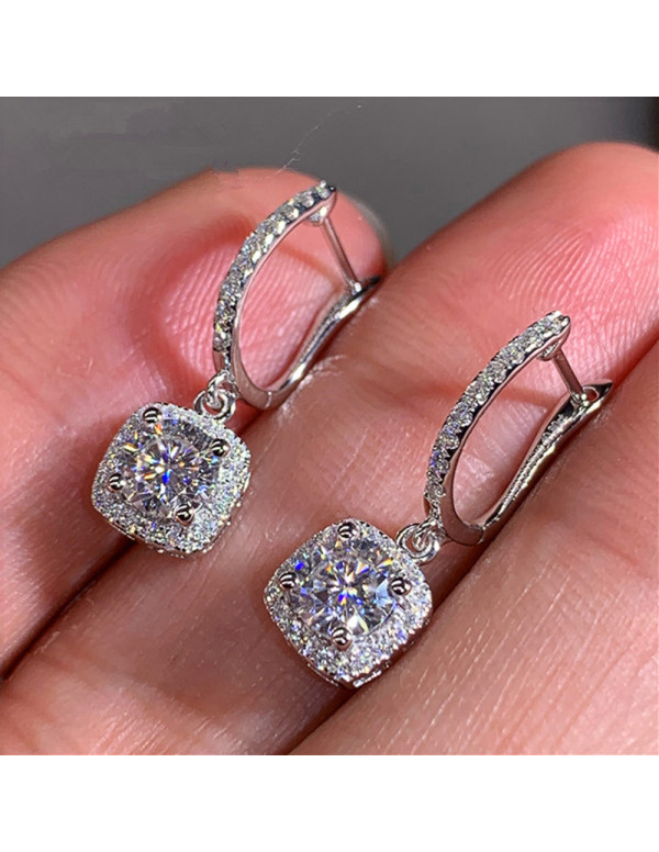 Jewels Galaxy Silver Plated American Diamond Studded Rectangular Crushed Ice Cut Drop Earrings