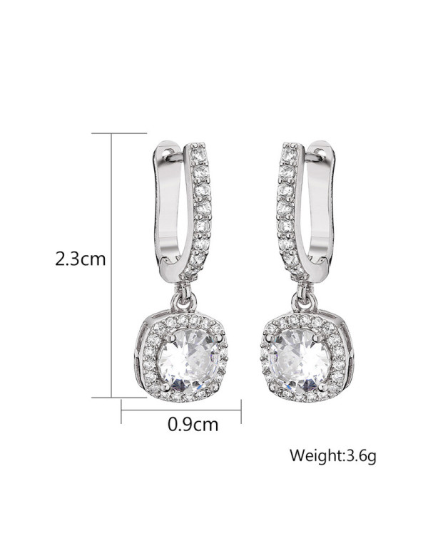 Jewels Galaxy Silver Plated American Diamond Studded Rectangular Crushed Ice Cut Drop Earrings