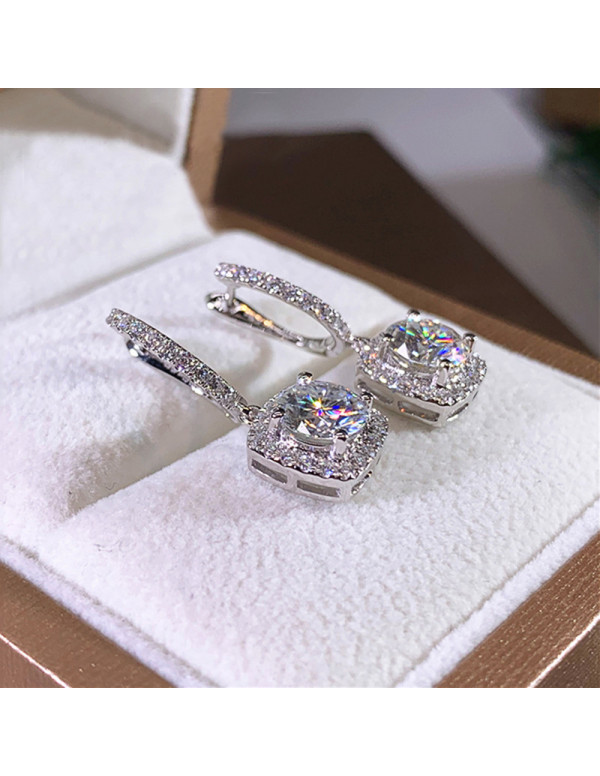 Jewels Galaxy Silver Plated American Diamond Studded Rectangular Crushed Ice Cut Drop Earrings