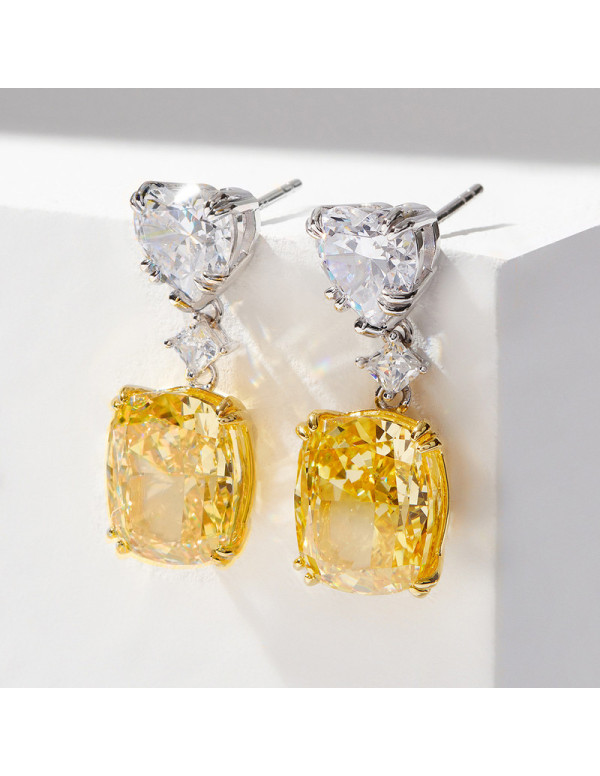 Jewels Galaxy Silver Plated AD Studded Silver Heart inspired Yellow Crushed Ice Cut Drop Earrings