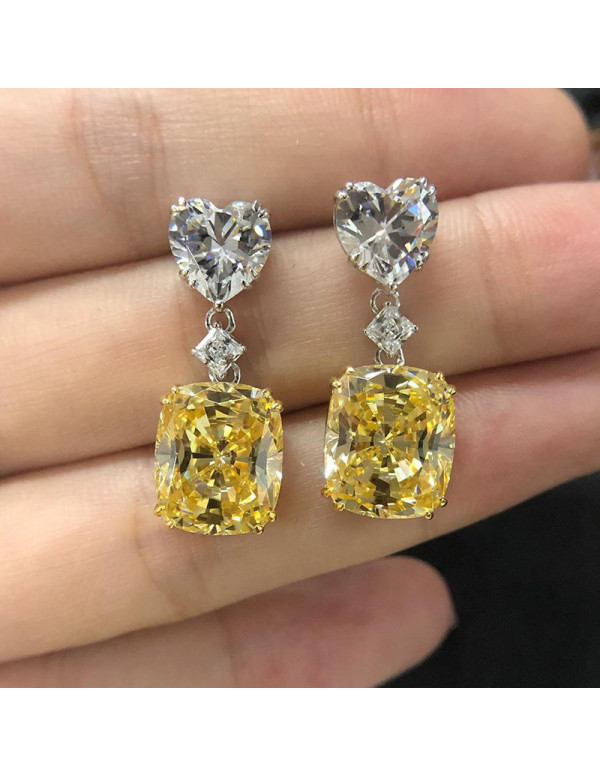 Jewels Galaxy Silver Plated AD Studded Silver Heart inspired Yellow Crushed Ice Cut Drop Earrings