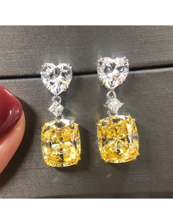 Jewels Galaxy Silver Plated AD Studded Silver Heart inspired Yellow Crushed Ice Cut Drop Earrings