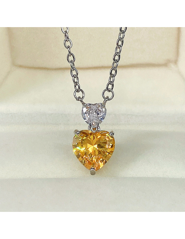 Jewels Galaxy Silver Plated American Diamond Studded Yellow Heart Shape Pendant