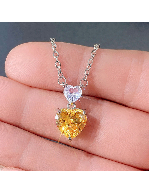 Jewels Galaxy Silver Plated American Diamond Studded Yellow Heart Shape Pendant