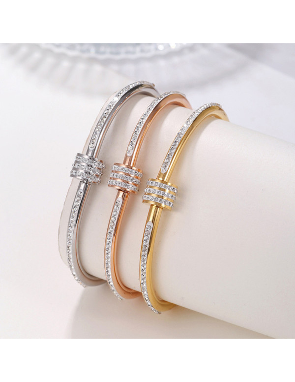 Jewels Galaxy Stainless Steel Gold, Rose Gold and Silver Plated American Diamond Studded Bangle Style Bracelet