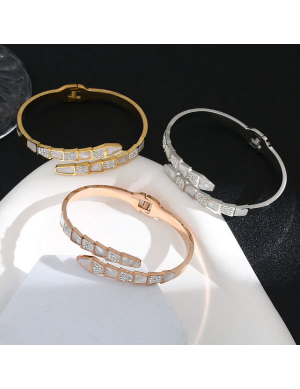 Jewels Galaxy Stainless Steel Gold, Rose Gold and Silver Mother Of Pearl Snake Styled AD Studded Bracelet