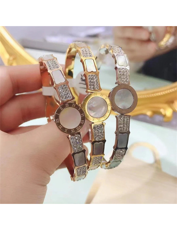 Jewels Galaxy Stainless Steel Gold, Rose Gold and Silver Mother Of Pearl Roman Numerals AD Studded Bracelet