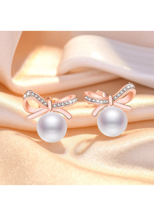 Jewels Galaxy Rose Gold Plated American Diamond Studded Bow-Tie Shape Korean Stud Earrings