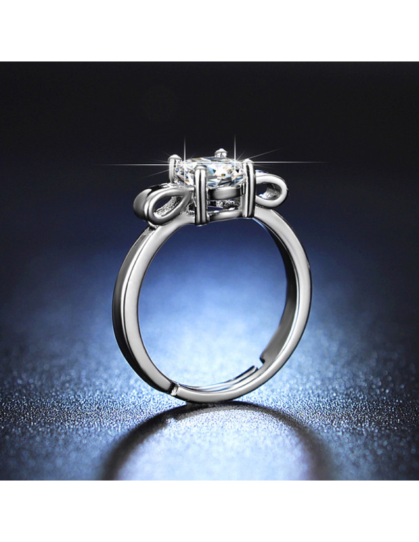 Jewels Galaxy Silver Plated Crystal Studded Bow Tie inspired Solitaire Adjustable Finger Ring